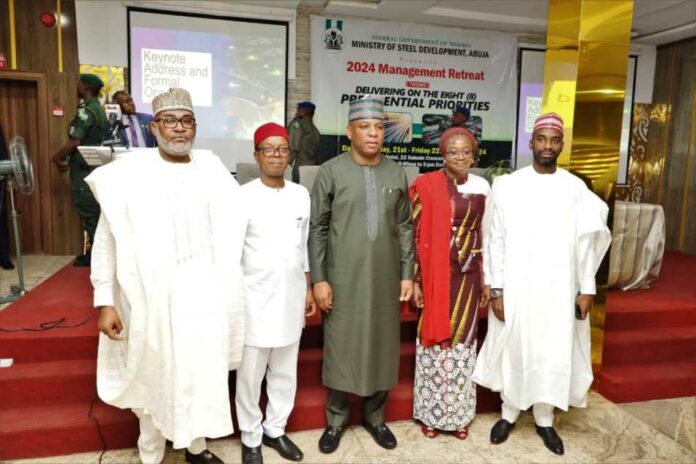 Middle; Prince Shuaibu Abubakar Audu, Honorable Minister of Steel Development, far right; H. E, Uba Maigari Ahmadu; Hon. Minister of State; immediate Right, Sen. Patrick Ndubueze, Chairman Senate Committee on Steel Development; Left, Permanent Secretary of the Ministry of Steel Development, Dr. Mary Ogbe with Rep. of the Chairman, House Committee on Steel Development, Deputy Chairman House Committee on Steel Development, Hon. Yusuf Umar Datti, at the Opening Ceremony of the 2024 Ministerial Management Retreat held at the K-Class Hotel, Abuja on the 21st March, 2024.