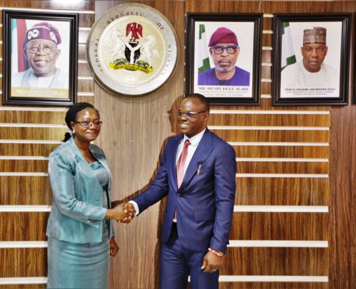 The new Permanent Secretary, Ministry of Steel Development, Dr. Chris Osa Isokpunwu (right) with the former Permanent Secretary, Ministry of Steel Development, Dr. Mary A Ogbe (left) during the Handover Ceremony held on July 29, 2024 at the Ministers' Conference Hall, Ministry of Solid Minerals/Steel Development Headquarters, Abuja.