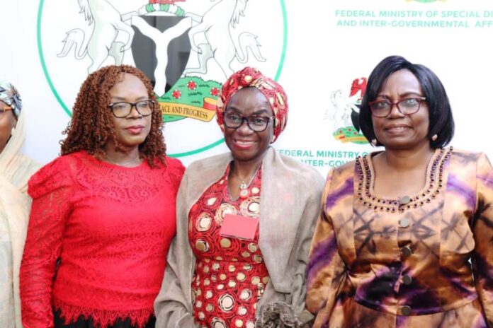 The new PS, FMSDIGA, Maryam Keshinro (m) flanked by PS, Cabinet Affairs Office, Dr. Emanso Umobong (l) & former PS, Ibiene Roberts at the handover ceremony.