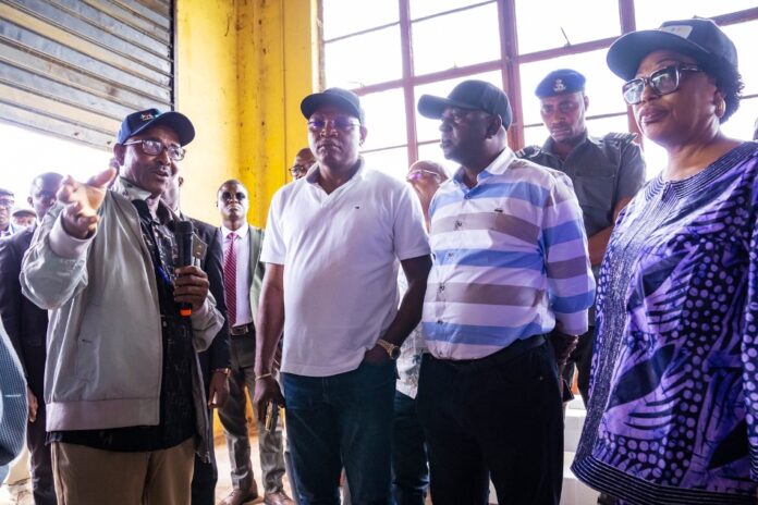 The Honourable Minister of Water Resources and Sanitation, Engr. Prof. Joseph Terlumun Utsev (2nd from right), Dr. Adedeji Ashiru, Managing Director of Ogun-Oshun RBDA (3rd from left), and other members of the Minister’s entourage being briefed by Mrs. Florence Oyakhirome (right), representative of the Director of Irrigation and Drainage, during the inspection visit to the Middle Ogun Irrigation Project (MOIP).