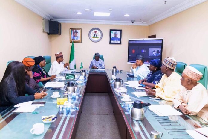 FROM LEFT TO RIGHT 1. Olotu Funmi - NASSCO 2. Abel Enitan - Permanent Secretary, Federal Ministry of Humanitarian Affairs and Poverty Alleviation (FMHAPA) 3. Aisha Omar - RCP PS-FMF 4. Abubakar Atiku Bagudu - Minister of Budget and Economic Planning 5. Wale Edun - Honorable Minister of Finance and Coordinating Minister of the Economy 6. Mohammed Idris Malagi - Minister of Information and National Orientation 7. Elsie Attafuah - Resident Representative, UNDP Nigeria. 8. Badamasi Lawal - National Coordinator - NSIPA 9. Abdullahi Imam - NCTO