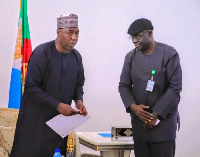 (Left to Right) The Executive Governor of Borno State, His Excellency, Professor Babagana Zulum receiving a condolence letter on the devastating flood in the State from the Permanent Secretary Federal Ministry of Humanitarian Affairs and Poverty Alleviation, Abel O. Enitan, on Thursday 12th September, 2024 at Borno State Government House