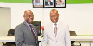 Hon. Minister of Sport Development, Sen. John Owan Enoh, in a handshake with the Chairman of Investigative committee on the various negative exposure to the country at the Paris 2024 Olympics and Paralympic Games, Dr. Mumini Alao, after the inauguration of the committee in Abuja on Wednesday, 25th September, 2024