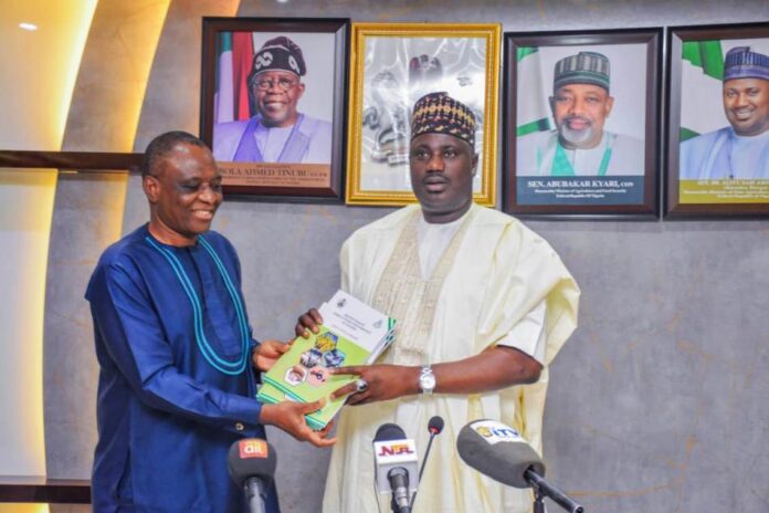 L-R, the Executive Director, NAERLS Prof. Emmanuel Ikani and Minister of State for Agriculture and Food Security,Sen Dr Aliyu Sabi Abdullahi, during the presentation of the 2024 Agricultural Performance Survey Report in Abuja.