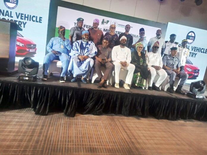 Middle Right: Hon. Seun Osiyemi, Honourable Commissioner of Transportation, Lagos State, Hajiya Jumai Katagom, Head PPP Unit, Federal Ministry of Finance, Abuja and others in a group photography at the South West Zonal sensitization seminar on National Vehicle Registry (VREG) held today in Lagos.