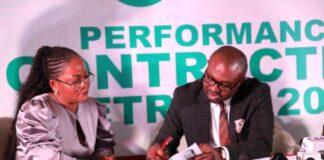 L-R: Engr Abisoye Coker-Odusote, DG/CEO, NIMC and Dr. Olubunmi Tunji-Ojo, Hon. Minister of Interior at the signing of a performance contract on Tuesday, 29 October 2024