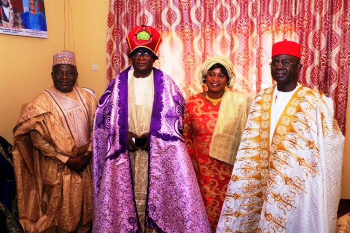 L-R: Brother of Celebrant Mr. Danladi Suleiman (Florida Based), His Royal Highness Luka Yakuwat Kogi and His Wife and Permanent Secretary, Ministry of Police Affairs, Mr. James Sule, Sardauna Kajju during the Royal Conferment on the Permanent Secretary by the Great Agwam Kajju II on Saturday, October 26, 2024, in Zonkwa, Zango Kataf Local Government Area, Kaduna State.