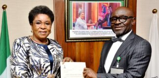 R-L: Mr Alfred Agaba Abah presenting his Letter of Appointment as SSAP to the Head of the Civil Service of the Federation, Mrs Didi Esther Walson-Jack, OON, mni.