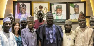 The Minister of State for Agriculture and Food Security, Sen Dr Aliyu Sabi Abdullahi (C), members of the National Tomato Grower's Processors and Marketers Association of Nigeria.