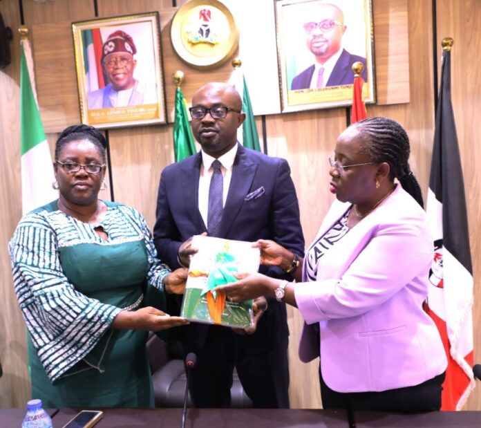 L-R: Dr. Uju Agomoh, President of Prisoners' Rehabilitation and Welfare Action (PRAWA); Dr. Olubunmi Tunji-Ojo, Hon. Minister of Interior and Dr. Magdalene Ajani, Permanent Secretary, Ministry of Interior during the submission of the phase one report of independent investigative panel on alleged corruption and other violations of SOP within NCoS