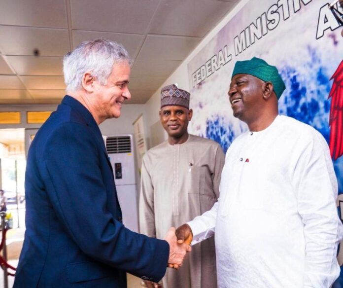 The Honourable Minister of Water Resources and Sanitation, Engr. Prof. Joseph Terlumun Utsev ( R) in a warm handshake with the World Bank Regional Director for West and Central Africa, Chakib Jenane (L). With them is the Honourable Minister of State for Water Resources and Sanitation Rt. Hon.Bello Muhammad Goronyo Esq. ( M) during the announcement of the approval of the SPIN project on Thursday, 3rd October in Abuja