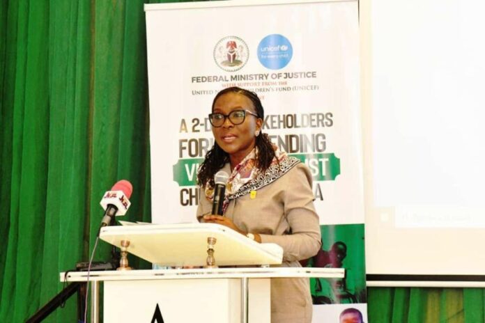 Solicitor General of the Federation and Permanent Secretary, Federal Ministry of Justice, Mrs. Beatrice Jedy-Agba, OON, mni, presenting Keynote Address at the opening session of a 2- day Stakeholders Forum on Ending Violence against Children in Nigeria at Abuja Continental Hotel. 7/10/2024