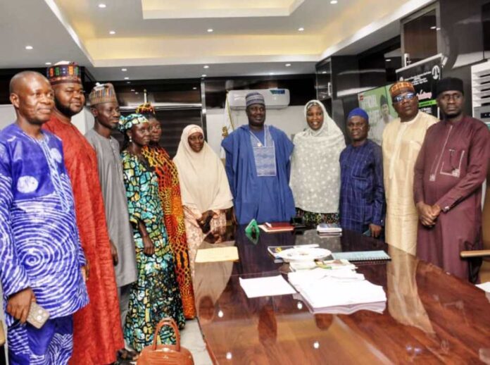 The Minister of State for Agriculture and Food Security, Sen.Dr Aliyu Sabi Abdullahi (C), School officials and Directors in the Ministry during the courtesy visit.