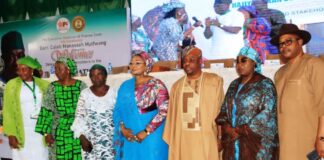 3rd from right, Ambassador Gabriel Aduda, Permanent Secretary, Federal Ministry of Women Affairs, Hajia Imaan Sulaiman-Ibrahim, fsi, Honourable Minister, FMWA, Rep. of the Plateau State Governor, Barr (Mrs) Olivia Daziam, and other dignitaries at the 24th Regular National Council on Women Affairs held in Jos, Plateau State