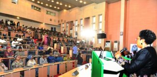 HCSF, Mrs Didi Esther Walson-Jack, OON, mni, reading her Address during the launch of the Service-Wise GPT, Federal Civil Service On-Line Academy and Govmail digitalisation tools in Abuja.