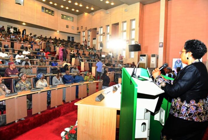 HCSF, Mrs Didi Esther Walson-Jack, OON, mni, reading her Address during the launch of the Service-Wise GPT, Federal Civil Service On-Line Academy and Govmail digitalisation tools in Abuja.