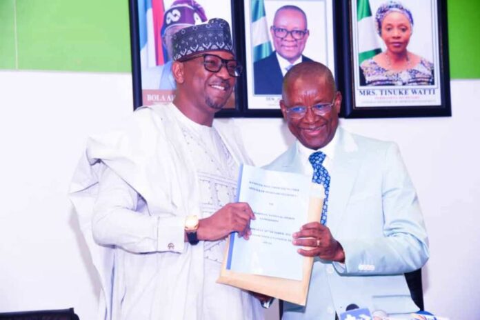 The outgoing Minister of Sport Development, Sen. John Owan Enoh and the newly appointed Chairman National Sports Commission, Mallam Shehu Dikko, during the handover ceremony held at the Media Centre, Moshood Abiola National Stadium, Abuja