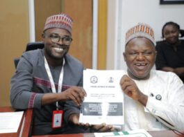 The Executive Secretary National Commission for Persons with Disabilities, Chief Ayuba Gufwan at Press time with the Country Director CBM Mr Abdulaziz Musa.