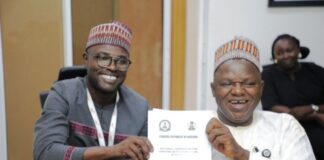 The Executive Secretary National Commission for Persons with Disabilities, Chief Ayuba Gufwan at Press time with the Country Director CBM Mr Abdulaziz Musa.