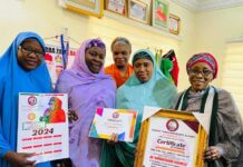 Honourable Commissioner Hajiya Amina Abdullahi Sani Receives Dual Awards as Peace Ambassador