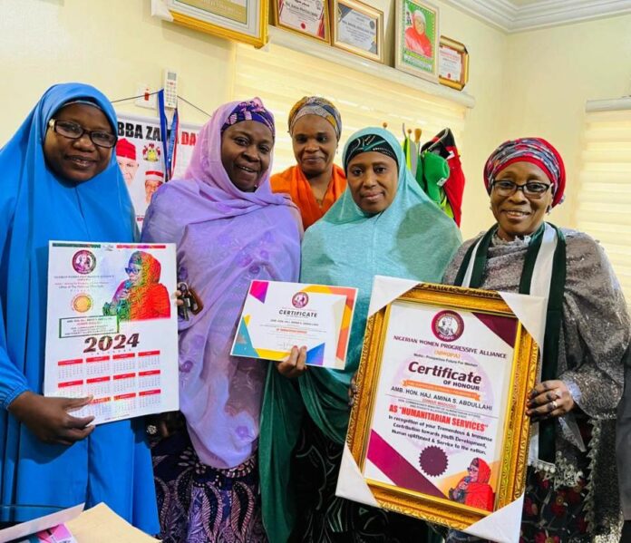 Honourable Commissioner Hajiya Amina Abdullahi Sani Receives Dual Awards as Peace Ambassador