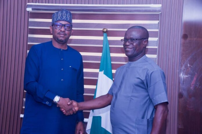 The Chairman, National Sports Commission, Mallam Shehu Dikko (left) with the Chairman, NPFL Club Owners Association, Chief Okey Kpalukwu during a courtesy visit by the association to the Chairman in his office on Thursday, 7th Nov. 2024