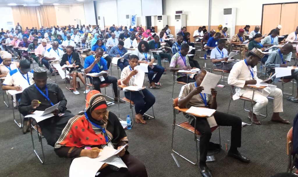 A cross section of participants at the Bureau of Public Procurement, (BPP) 2024 Mandatory Continuous Public Procurement Capacity Development Training Program during their examination,  after a three week training in Lagos. 09/11/24.