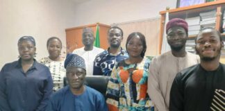 Acting Director General, Bureau of Public Procurement , Barr. Olusegun Omotola seated , around him are the just concluded NYSC members who served in the Bureau. The Ag DG hosted them November, 1 , 2024.