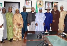 Minister of Labour and Employment, Dr. Muhammad Maigari Dingyadi (5th right); Director Overseeing the Office of the Permanent Secretary, John Nyamali (6th right); Executive Director, Mobil Producing Nigeria, Bala Aliyu (4th right) and members of his team with Directors of the Ministry during a courtesy visit by Mobil Producing Nigeria to the Minister, Abuja