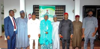 The Chairman, Senate Committee on Solid Minerals, Sen. Sampson Ekong (3rd left), Vice Chairman of the Senate Committee on Solid Minerals, Sen. Kabeeb Mustapha (4th right), Executive Secretary, Solid Minerals Development Fund (SMDF), Hajia Fatima Shinkafi (middle) and other members of the Committee during their oversight visit to SMDF