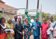 3rd Left, Representative of Prof. Nentawe Goshwe Yilwatda, Honourable Minister of Humanitarian Affairs and Poverty Reduction, the Director General Services, of the Ministry, Mr. Yakubu A. John, 3rd left, Deputy Director Overseeing the Office of the Director, Social Development, of the Ministry Mr. Peter Adanu Audu, Representative of Dr. Barr. Ndubueze Mbah, Hon. Commissioner for Education, Enugu State, Mrs. Ifeoma B. OnuIgbo (Area Lead Evaluator), Enugu East (Ujodo), Overseeing Provost, Federal School of Social Work, Emene (FSSWE), Enugu, Mr. Chris Ajibola and 1st right, Mr. Oparaku Modestus ( represented Engr. osita in Obiukwu) from NEMSA, during the commissioning of 100KVA Transformer purchased by the Ministry for the School of Social Work Emene, Enugu State on Tuesday 10th December 2024