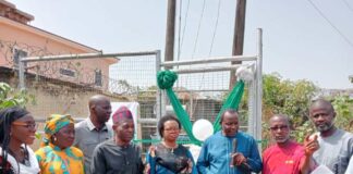 3rd Left, Representative of Prof. Nentawe Goshwe Yilwatda, Honourable Minister of Humanitarian Affairs and Poverty Reduction, the Director General Services, of the Ministry, Mr. Yakubu A. John, 3rd left, Deputy Director Overseeing the Office of the Director, Social Development, of the Ministry Mr. Peter Adanu Audu, Representative of Dr. Barr. Ndubueze Mbah, Hon. Commissioner for Education, Enugu State, Mrs. Ifeoma B. OnuIgbo (Area Lead Evaluator), Enugu East (Ujodo), Overseeing Provost, Federal School of Social Work, Emene (FSSWE), Enugu, Mr. Chris Ajibola and 1st right, Mr. Oparaku Modestus ( represented Engr. osita in Obiukwu) from NEMSA, during the commissioning of 100KVA Transformer purchased by the Ministry for the School of Social Work Emene, Enugu State on Tuesday 10th December 2024