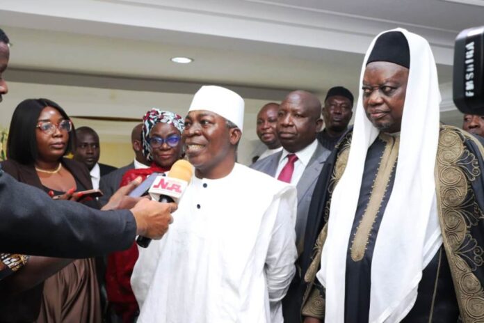 Honourable Minister, Federal Ministry of Special Duties and Inter-Governmental Affairs, Zaphaniah Bitrus Jisalo, grants interview to Pressmen after the inauguration. With him is HRH, Sidi Bage Mohammed1, Chairman of the National Honours Screening Committee.