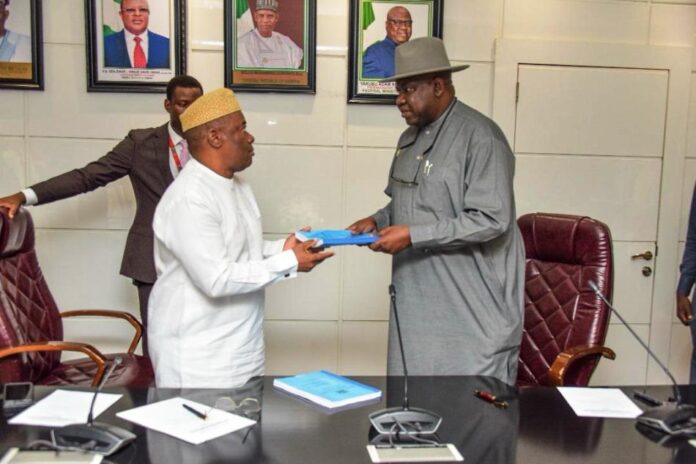 Handing Over Ceremony between the outgoing Permanent Secretary, Yakubu Adam Kofarmata, Ph.D (right) and the incoming, Engr. Olufunsho Olusesan Adebiyi (left) at the Federal Ministry of Works, 17th December, 2024.