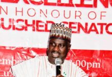 Hon. Minister of State for Agriculture and Food Security, Sen. Dr. Aliyu Sabi Abdullahi (CON), with the plaque depicting the Award of Excellence For Strategic Synergy For Good Governance, presented by the Senate Press Corps on December 16, 2024, at NICON Luxury Hotel, Abuja.