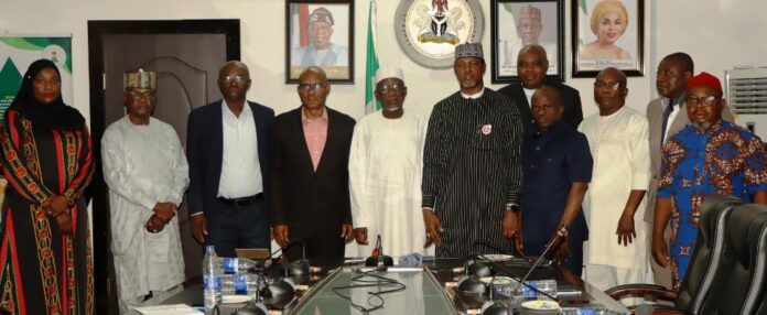 Minister of Labour and Employment, Muhammad Dingyadi (5th left); Director Overseeing the Office of the Permanent Secretary, John Nyamali (4th left); National President, Association of Senior Civil Servants of Nigeria (ASCN), Comrade Shehu Mohammed (6th left) with the Directors of the Ministry and other members of ASCN, during their visiting to the Minister, Abuja