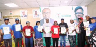 In the middle is the Permanent Secretary, Ministry of Interior, Dr. Magdalene Ajani in a group photograph with Directors of the Ministry of Interior at the Directors' Performance Contract Signing Ceremony