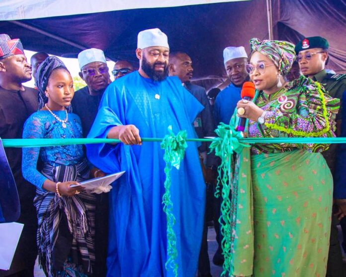 Honourable Minister of Women Affairs, Hajiya Imaan Sulaiman-Ibrahim commissioning the World Bank Sponsored Nassara Izom 2 Women Rice Processsing Factory under the Nigeria For Women Project (NFWP) in Gwachipe, Gurara Local Government Area of Niger State. To her right is the State Governor, Mohammed Umaru Bago