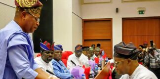 The Honourable Minister of Marine and Blue Economy, Adegboyega Oyetola CON, (r) presents the budget of the Ministry and its Agencies to the Chairman, Senate Committee on Marine Transport, Senator Wasiu Eshinlokun (l).