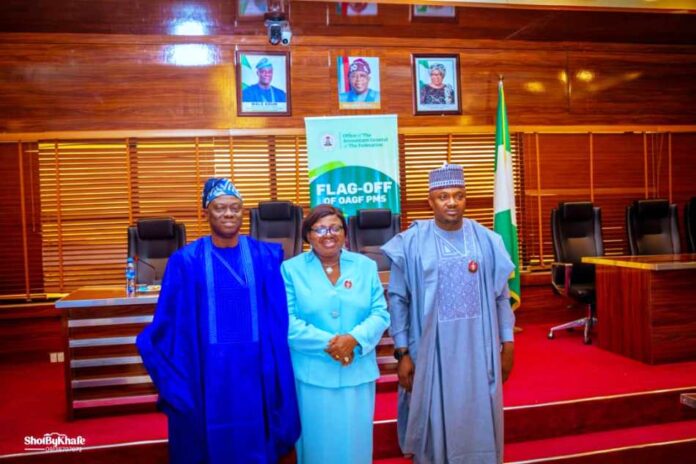 from the middle the Chairman House Committee on Public Account Rep Bamidele Salam, the Accountant General of the Federation Dr. Mrs Oluwatoyin Sakirat Madein FCCA FCA and the members of the House Committee on Public Account during their oversight visit to the OAGF recently.