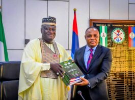 The New Permanent Secretary Ministry of Defence, Ambassador Gabriel Tanimu Aduda is with the Outgoing Permanent Secretary of the Ministry, Dr. Ibrahim Abubakar Kana mni.