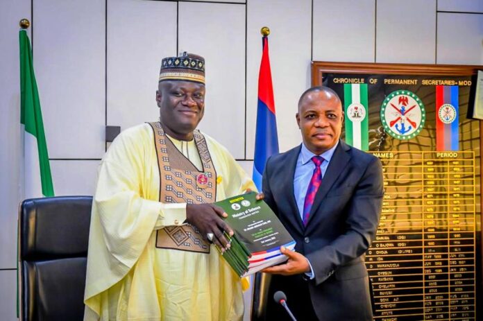 The New Permanent Secretary Ministry of Defence, Ambassador Gabriel Tanimu Aduda is with the Outgoing Permanent Secretary of the Ministry, Dr. Ibrahim Abubakar Kana mni.