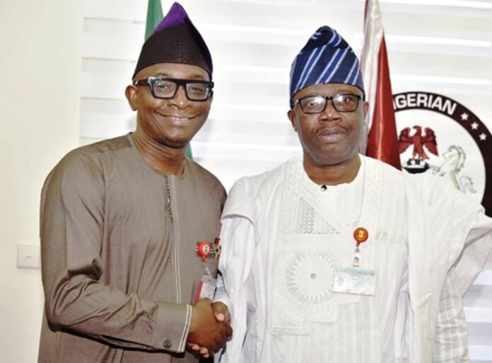 L-R: Director-General, Bureau of Public Procurement (BPP) Dr. Adebowale A. Adedokun, MCIPS in a warm handshake with the Chairman, Senate Committee on Public Procurement, Sen. Olajide Ipinsagba Emmanuel during the BPP 2025 Budget Defence