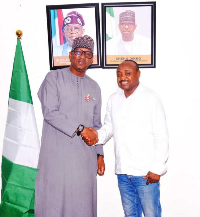 NSC Chairman Mallam Shehu Dikko in a warm handshake with Professional Footballers Association of Nigeria (PFAN) President Tijani Babangida.