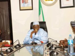 Minister of Labour and Employment, Muhammad Maigari Dingyadi (3rd right); Director Overseeing the Office of the Permanent Secretary, Laureta Adogu (2nd left); Director, Trade Unions Services and Industrial Relations, Falonipe Amos (left); Deputy General Secretary, Nigeria Labour Congress, Ismail Bello (2nd right); Chairman, Edo State NLC, Odion Olaye (left) during their meeting with the Minister, Abuja