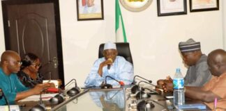 Minister of Labour and Employment, Muhammad Maigari Dingyadi (3rd right); Director Overseeing the Office of the Permanent Secretary, Laureta Adogu (2nd left); Director, Trade Unions Services and Industrial Relations, Falonipe Amos (left); Deputy General Secretary, Nigeria Labour Congress, Ismail Bello (2nd right); Chairman, Edo State NLC, Odion Olaye (left) during their meeting with the Minister, Abuja