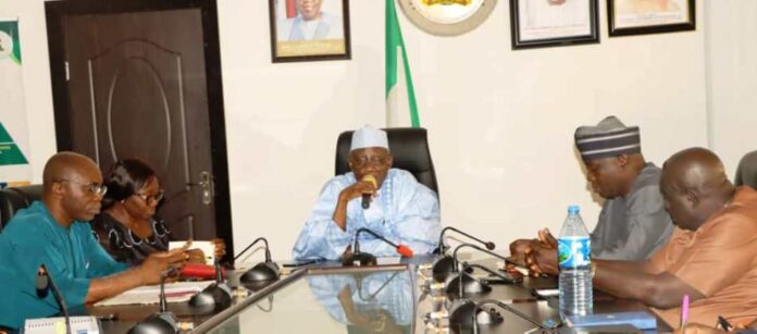 Minister of Labour and Employment, Muhammad Maigari Dingyadi (3rd right); Director Overseeing the Office of the Permanent Secretary, Laureta Adogu (2nd left); Director, Trade Unions Services and Industrial Relations, Falonipe Amos (left); Deputy General Secretary, Nigeria Labour Congress, Ismail Bello (2nd right); Chairman, Edo State NLC, Odion Olaye (left) during their meeting with the Minister, Abuja