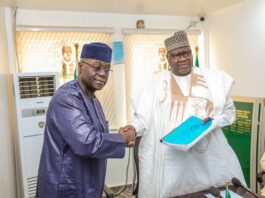 Right, Permanent Secretary Federal Ministry of Humanitarian Affairs and Poverty Reduction, Dr Yakubu Adam Kofarmata and the out going Permanent Secretary Abel Enitan, during their handing and taking over ceremony held on Tuesday 31st December 2024 at the Ministry's Headquarters Federal Secretariat Abuja