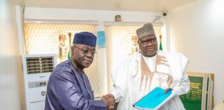 Right, Permanent Secretary Federal Ministry of Humanitarian Affairs and Poverty Reduction, Dr Yakubu Adam Kofarmata and the out going Permanent Secretary Abel Enitan, during their handing and taking over ceremony held on Tuesday 31st December 2024 at the Ministry's Headquarters Federal Secretariat Abuja