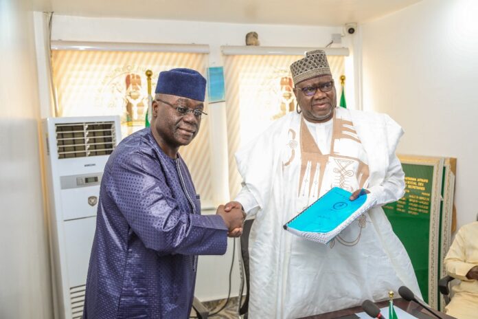 Right, Permanent Secretary Federal Ministry of Humanitarian Affairs and Poverty Reduction, Dr Yakubu Adam Kofarmata and the out going Permanent Secretary Abel Enitan, during their handing and taking over ceremony held on Tuesday 31st December 2024 at the Ministry's Headquarters Federal Secretariat Abuja